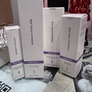 Rodan + Fields Unblemish Skincare Collection - White and Purple Packaging